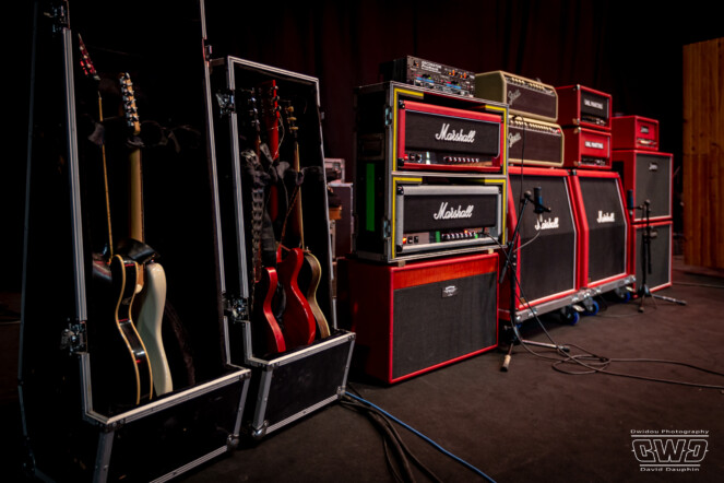 Backline on stage or backstage, drums, guitars, bass, amps, keybords, pedals